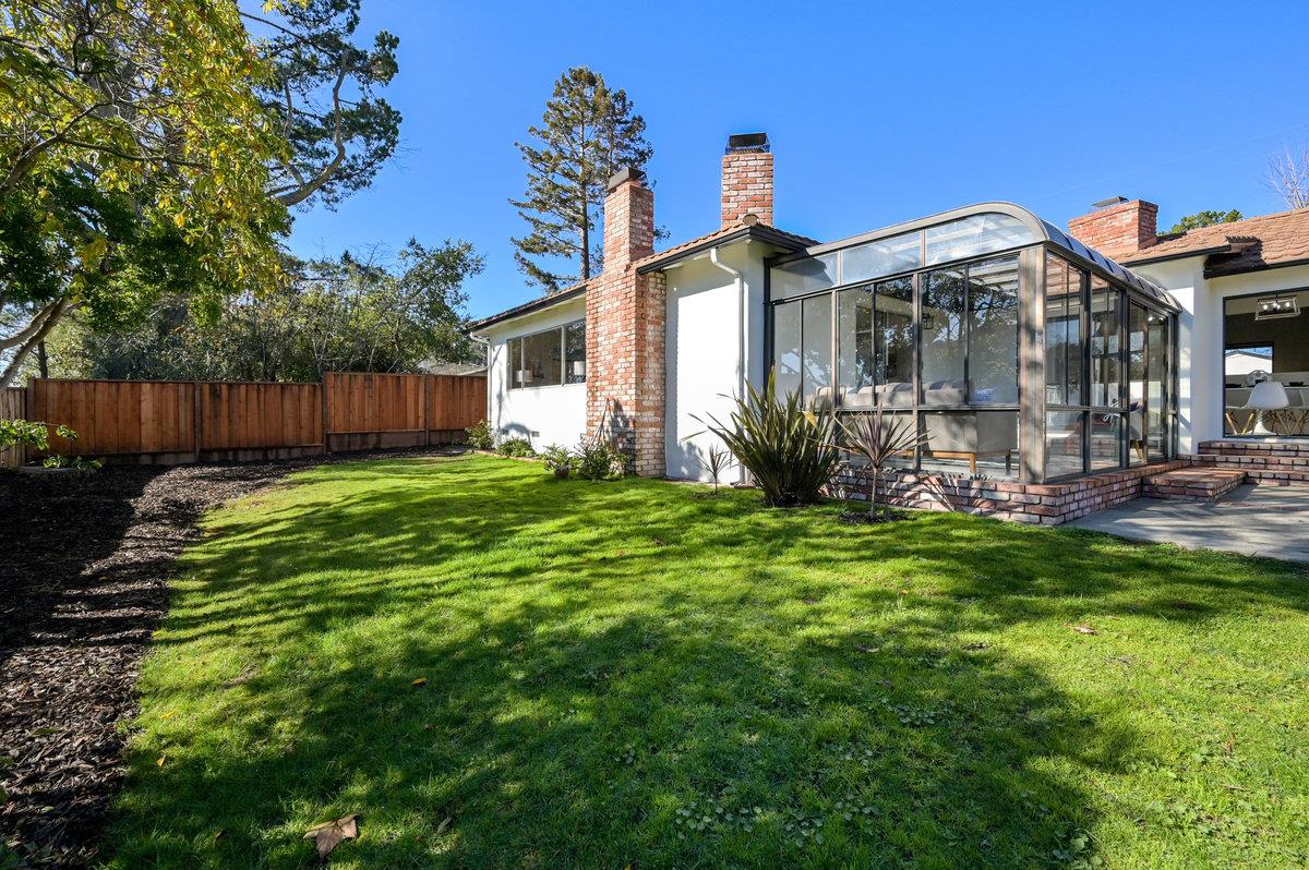 2135 Queens Lane San Mateo, CA 94402 - Photo 42 of 50 a front view of a house with garden