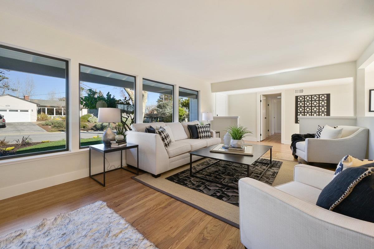 2135 Queens Lane San Mateo, CA 94402 - Photo 6 of 50 a living room with furniture and a large window