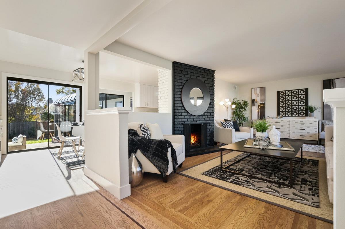 2135 Queens Lane San Mateo, CA 94402 - Photo 7 of 50 a living room with furniture and a fireplace