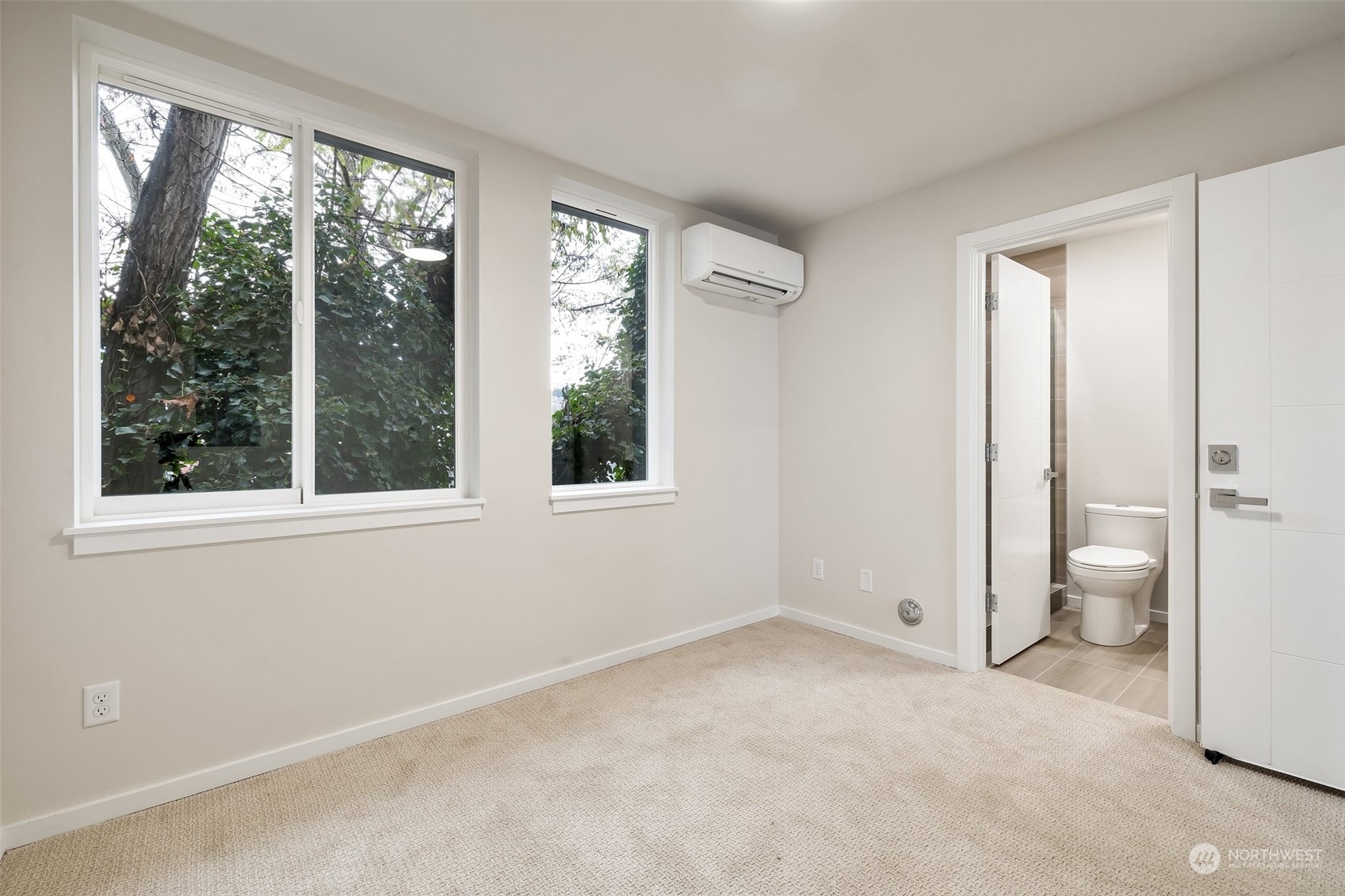 4549 Renton Avenue South, Unit D Seattle, WA 98108 - Photo 13 of 15 a view of an empty room with a window