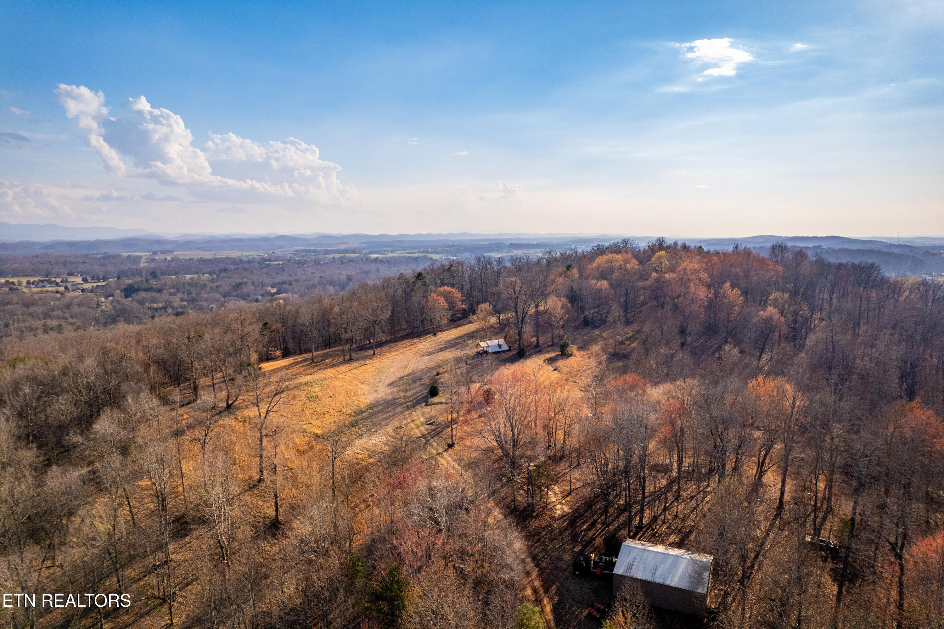 184 Badger Road Madisonville, TN 37354 - Photo 3 of 31 Drone of barn and cabin