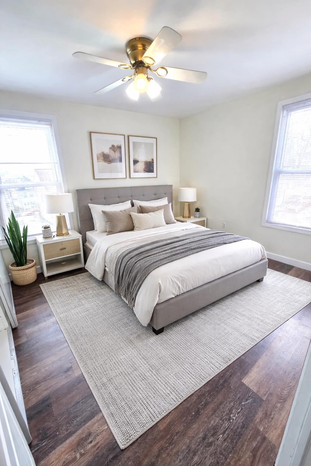 438 Devon Street, Unit 2 Kearny, NJ 07032 - Photo 12 of 27 a bedroom with a large bed chandelier and a window