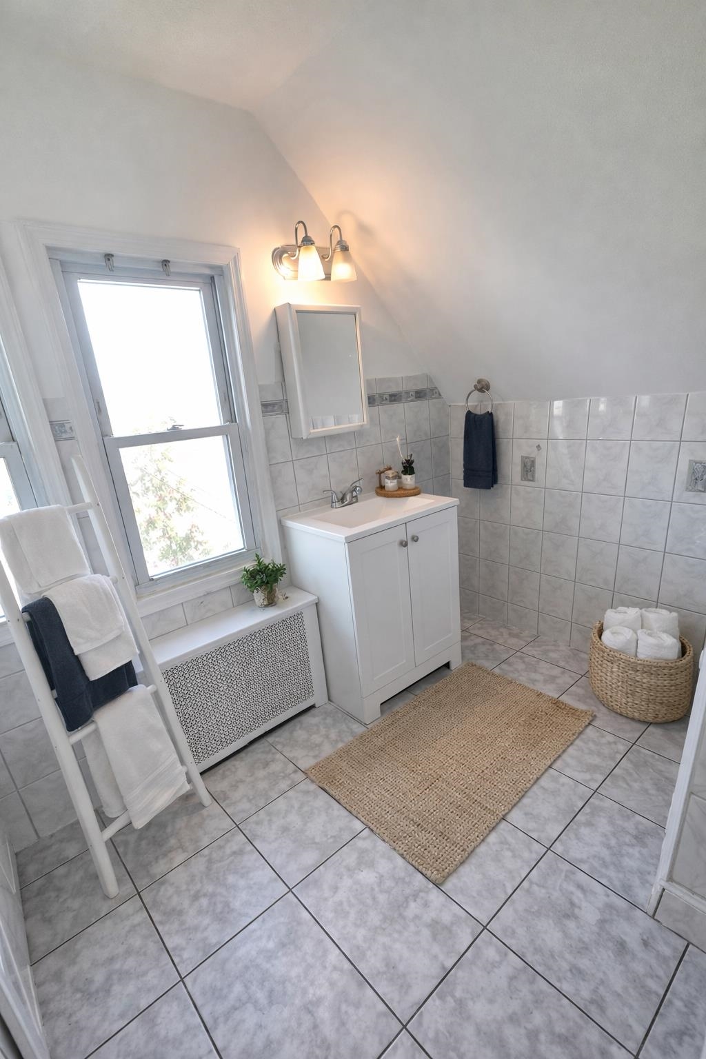 438 Devon Street, Unit 2 Kearny, NJ 07032 - Photo 16 of 27 a spacious bathroom with a bathtub a mirror a vanity and a shower