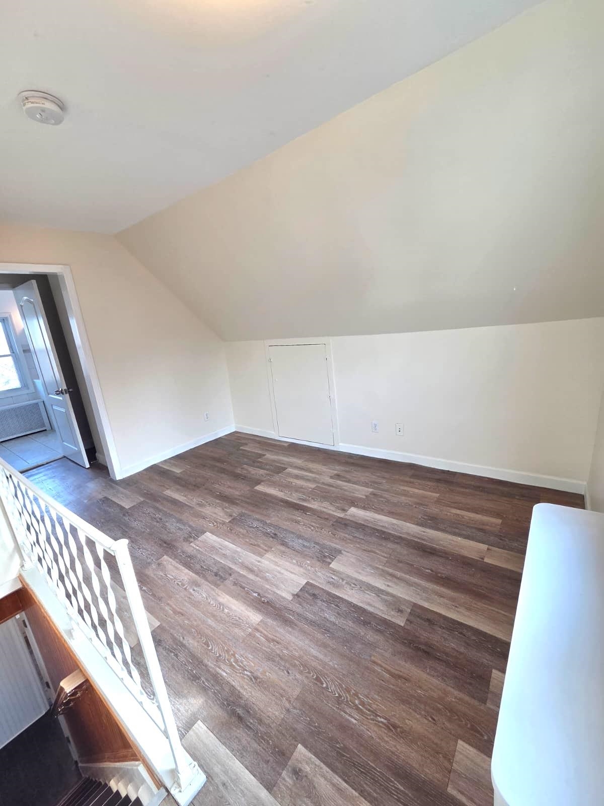 438 Devon Street, Unit 2 Kearny, NJ 07032 - Photo 21 of 27 a view of wooden floor and staircase