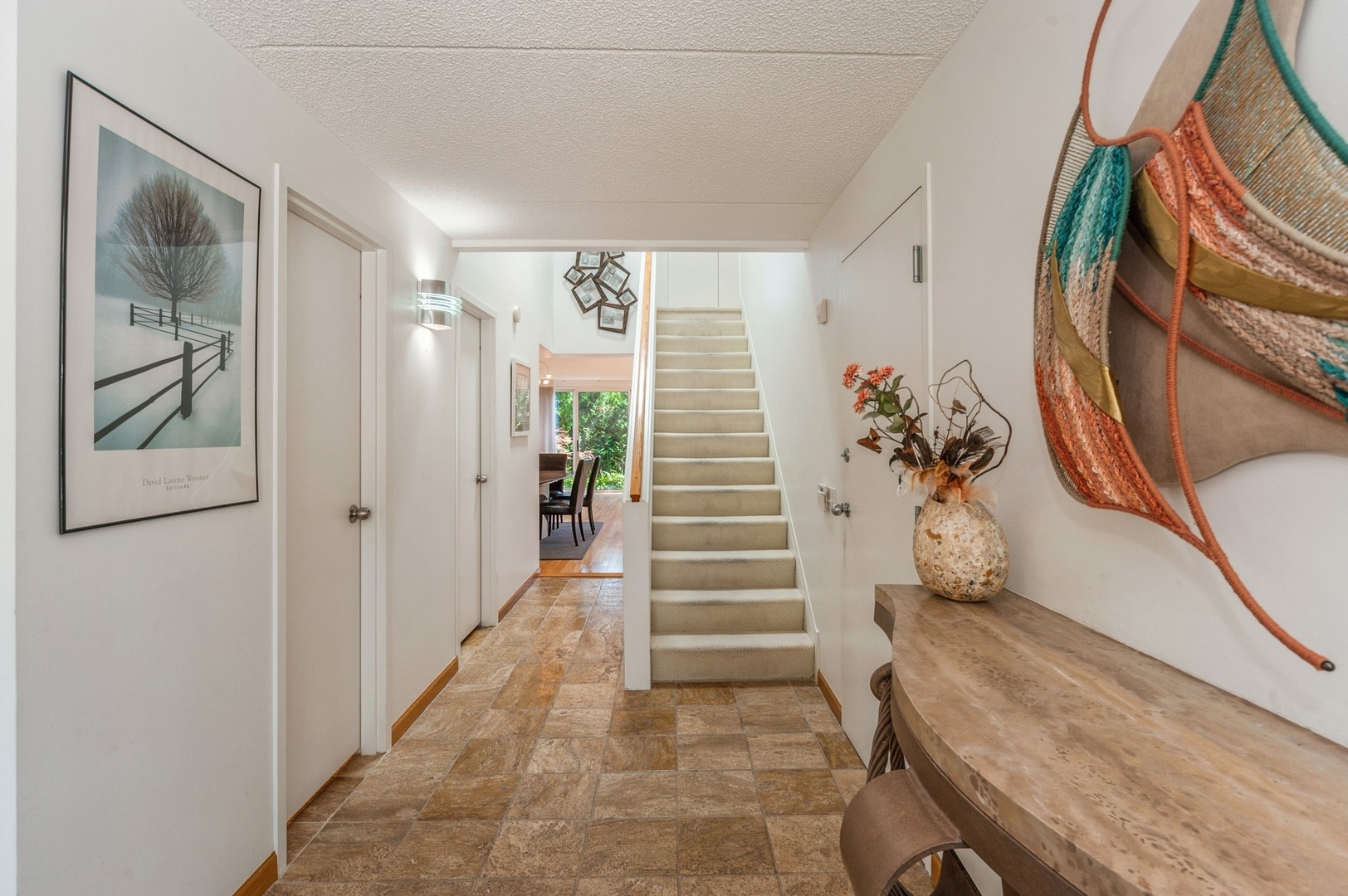 53 Avon Road Northbrook, IL 60062 - Photo 3 of 26 a view of entryway with wooden floor and stairs