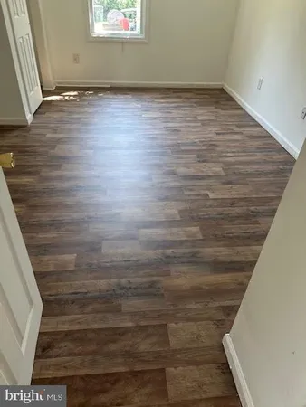 a view of a small space built with hardwood