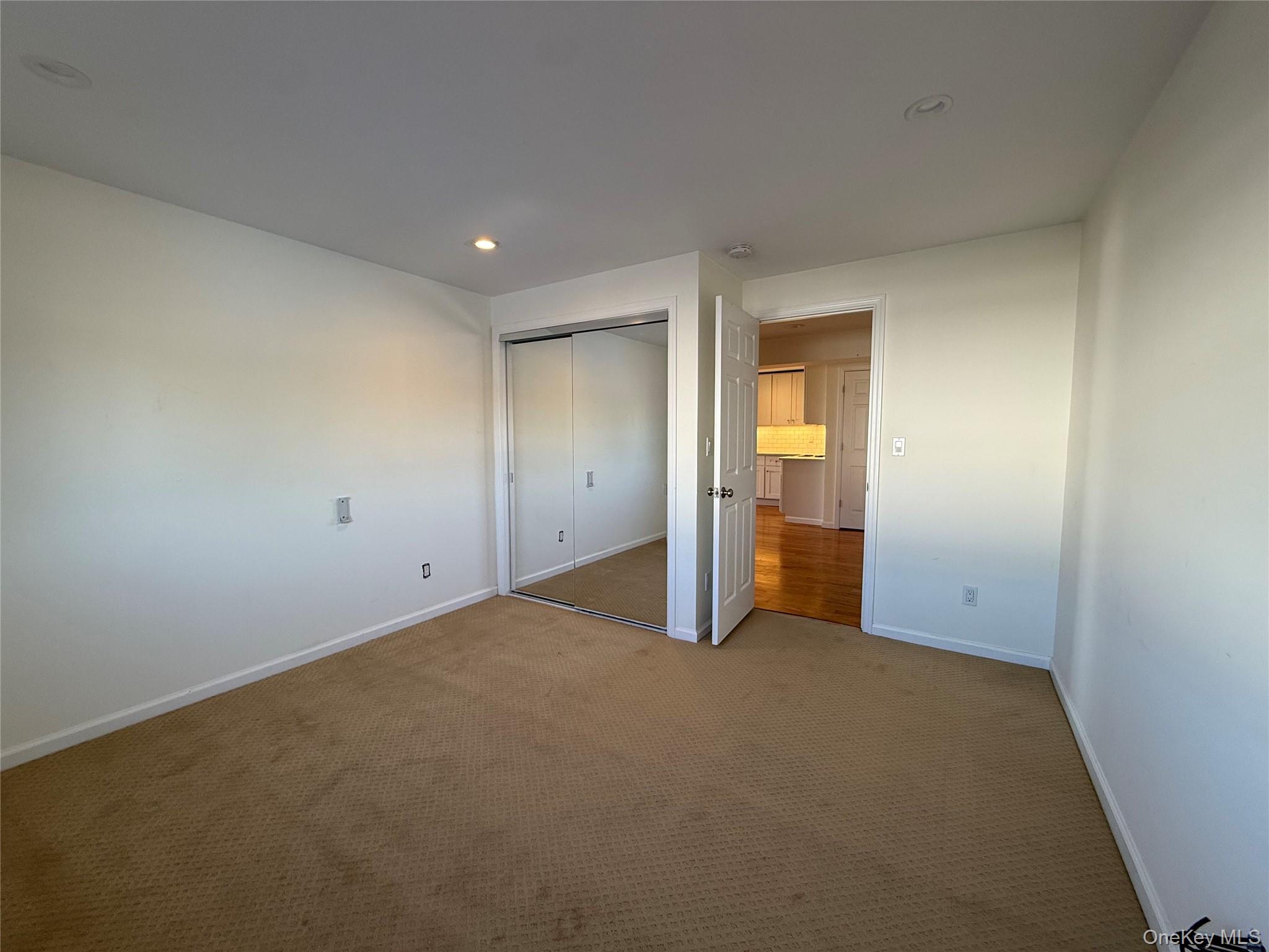 505 South Main Street Freeport, NY 11520 - Photo 5 of 10 Bedroom with carpet floor