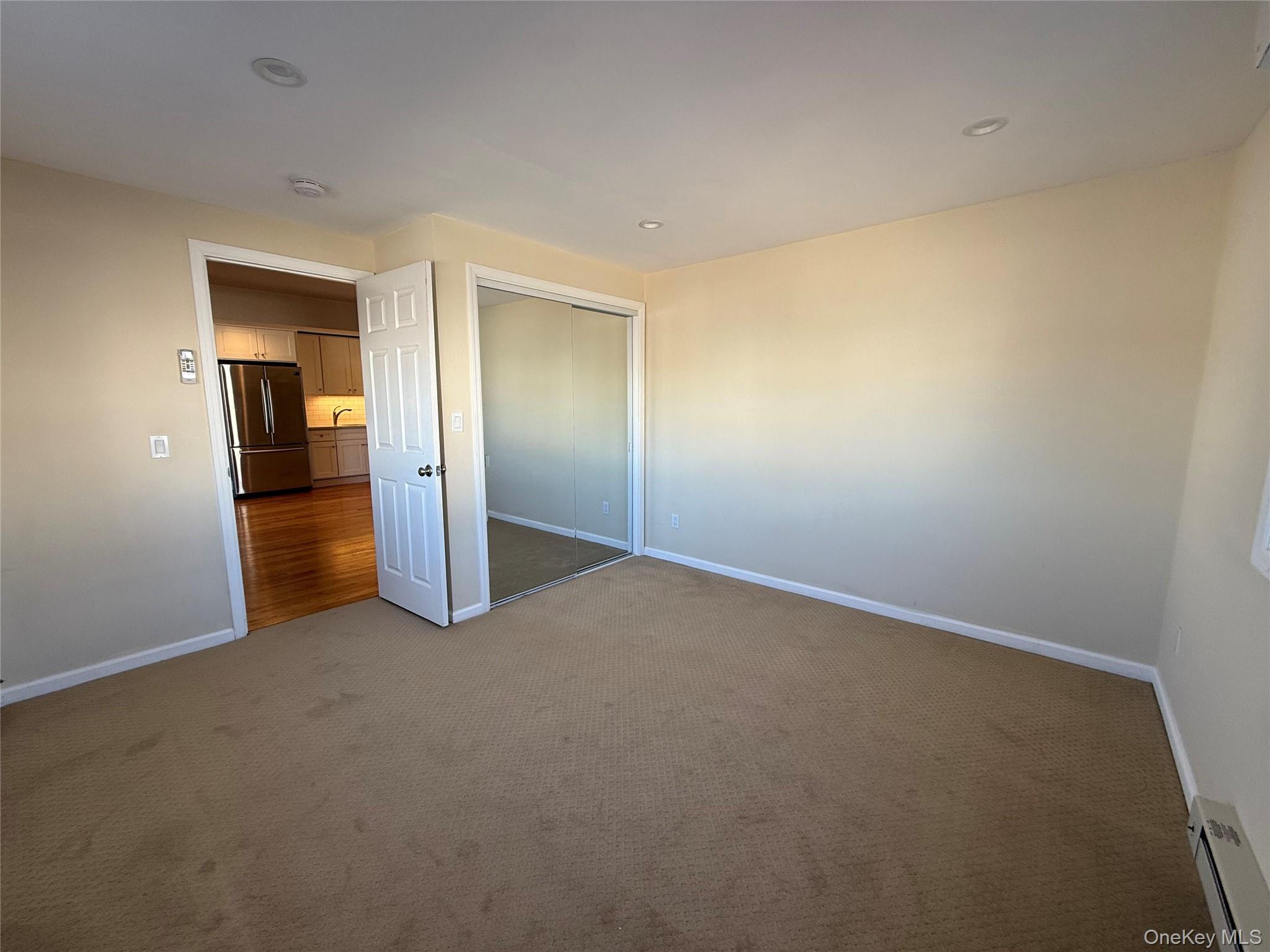 505 South Main Street Freeport, NY 11520 - Photo 6 of 10 Bedroom with carpet floor