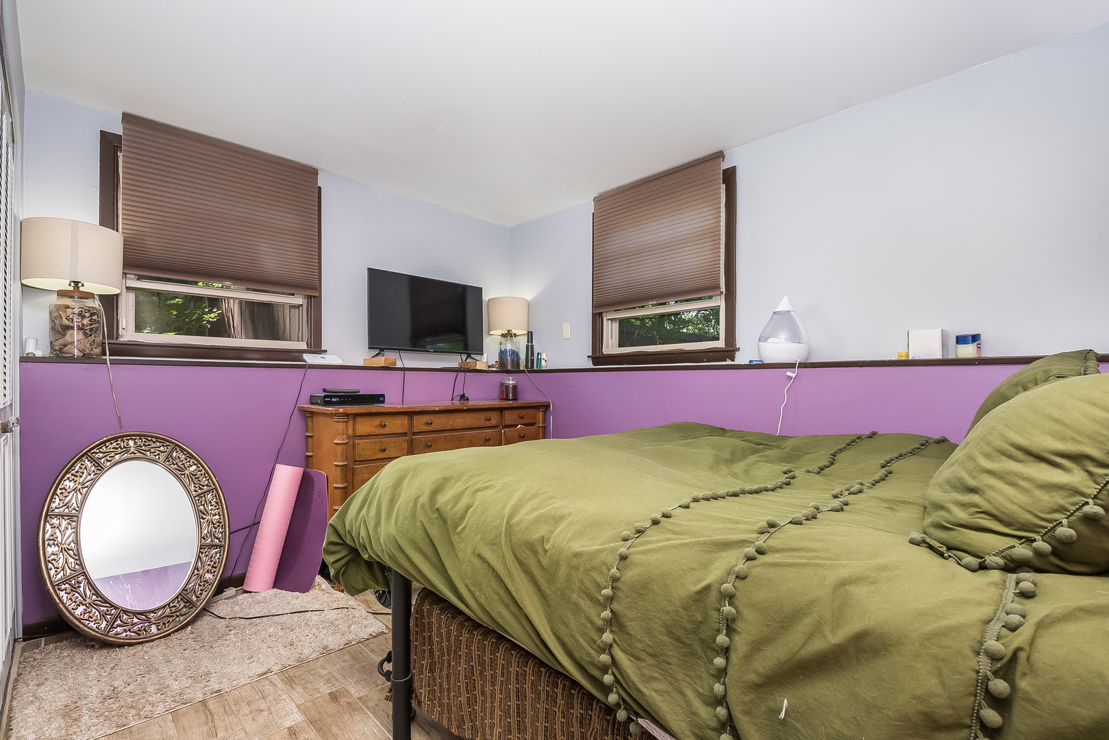 23 Fernwood Road Montgomery, IL 60538 - Photo 14 of 17 a bed with a bed and mirror