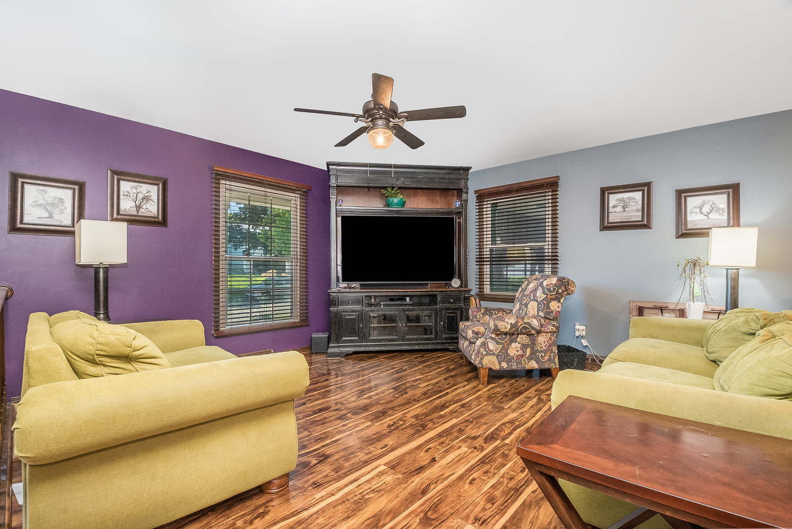 23 Fernwood Road Montgomery, IL 60538 - Photo 3 of 17 a living room with furniture wooden floor and a flat screen tv