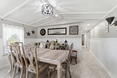 a view of a dining room with furniture