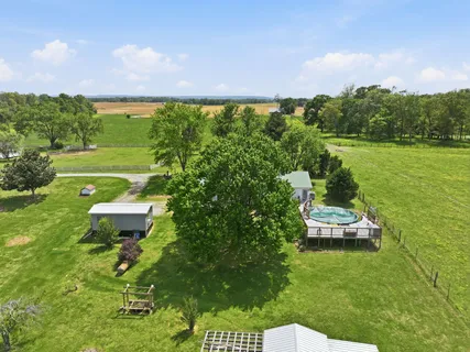 a view of a lake with a big yard