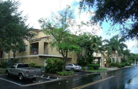 741 North Pine Island Road, Unit 303 Plantation, FL 33324 - Photo 2 of 12 a house view with a garden space