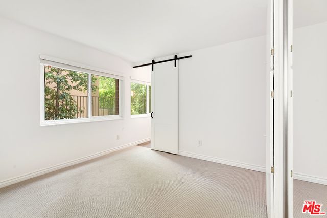 a bathroom with a sink and a large mirror
