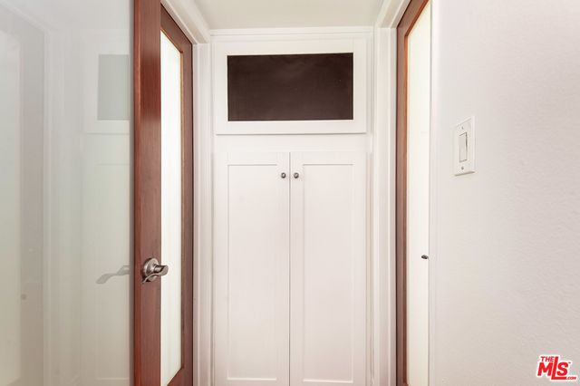 a bathroom with a sink a vanity and a mirror