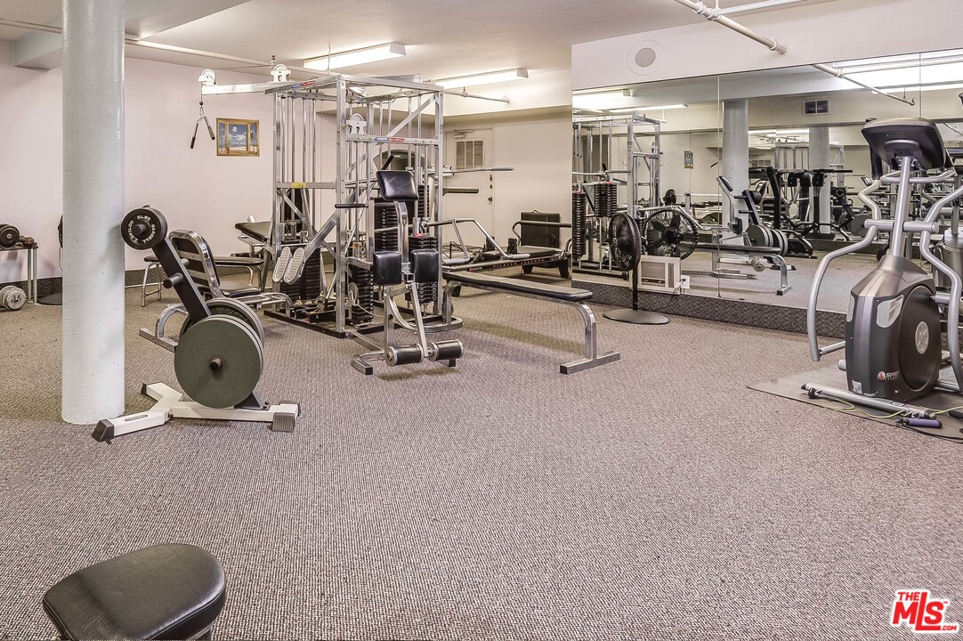 11750 Sunset Boulevard, Unit 123 Los Angeles, CA 90049 - Photo 24 of 31 a view of a room with gym equipment