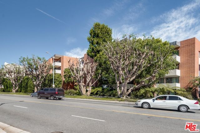 a view of a garage with storage