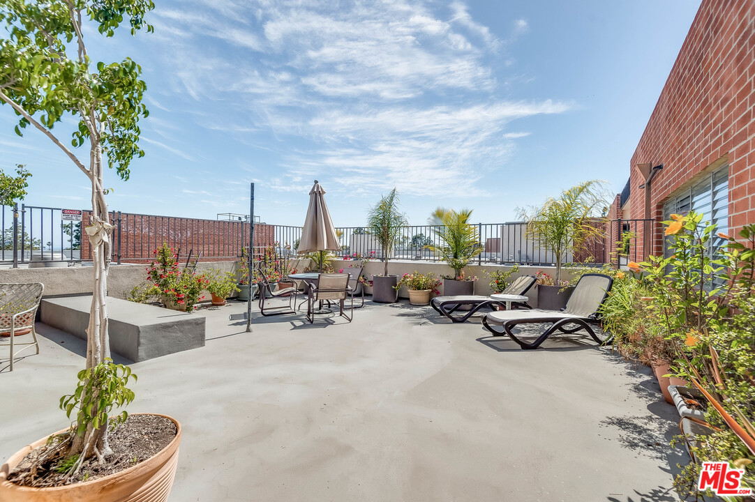 11750 Sunset Boulevard, Unit 123 Los Angeles, CA 90049 - Photo 7 of 31 a view of a terrace with sitting area