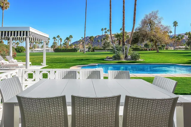 a view of a house with a swimming pool
