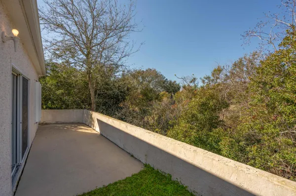 a view of a swimming pool with lounge chair