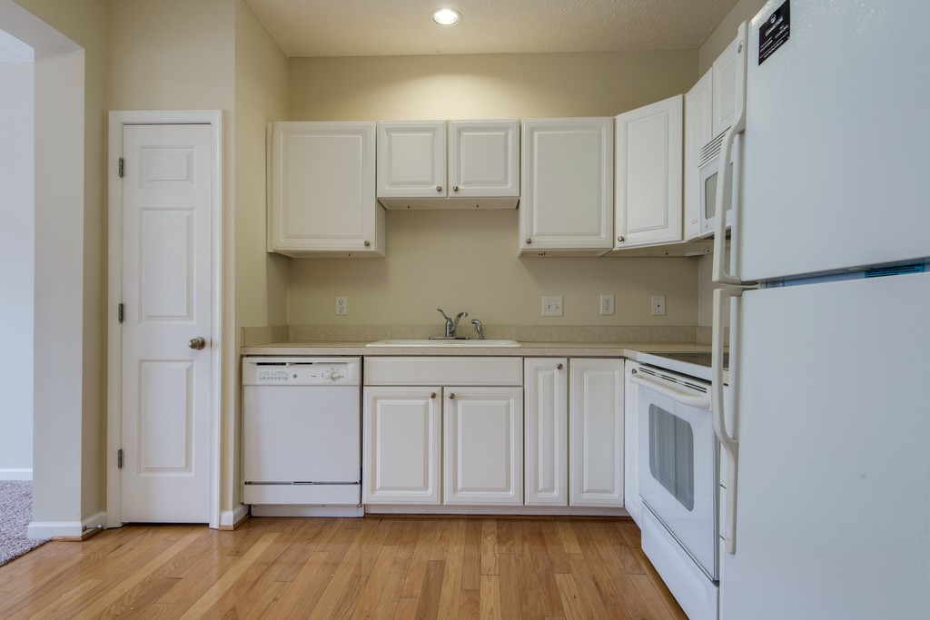 7831 Heaton Way Nashville, TN 37211 - Photo 12 of 35 a kitchen with stainless steel appliances granite countertop a refrigerator and a stove top oven