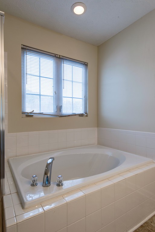 7831 Heaton Way Nashville, TN 37211 - Photo 20 of 35 a bathroom with a bathtub