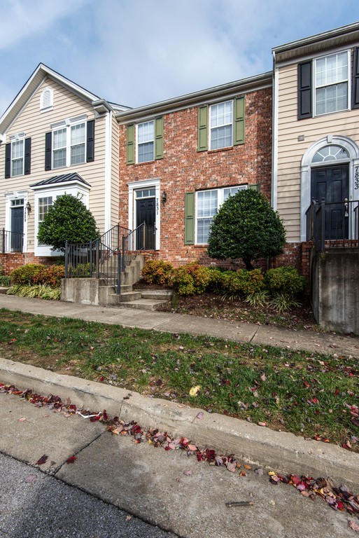 7831 Heaton Way Nashville, TN 37211 - Photo 2 of 35 a front view of a house with garden