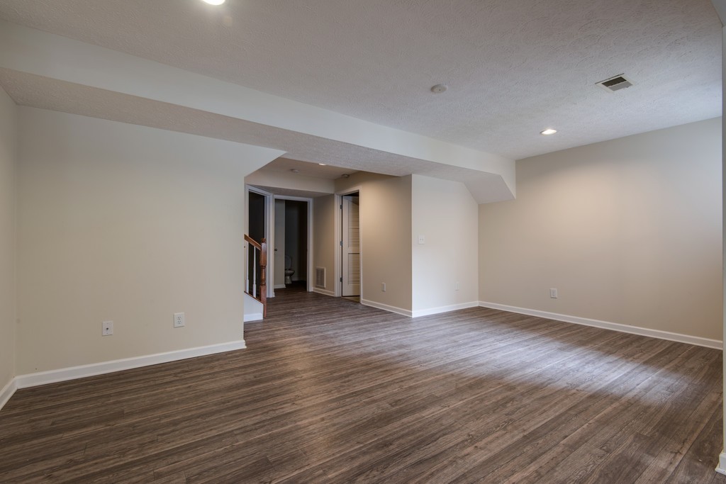 7831 Heaton Way Nashville, TN 37211 - Photo 30 of 35 a view of an empty room with wooden floor and closet