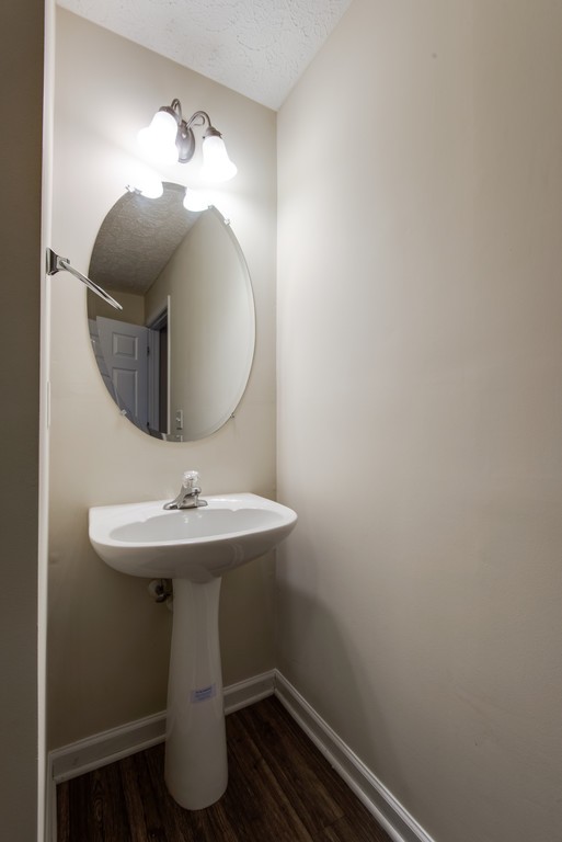 7831 Heaton Way Nashville, TN 37211 - Photo 32 of 35 a bathroom with a sink and mirror