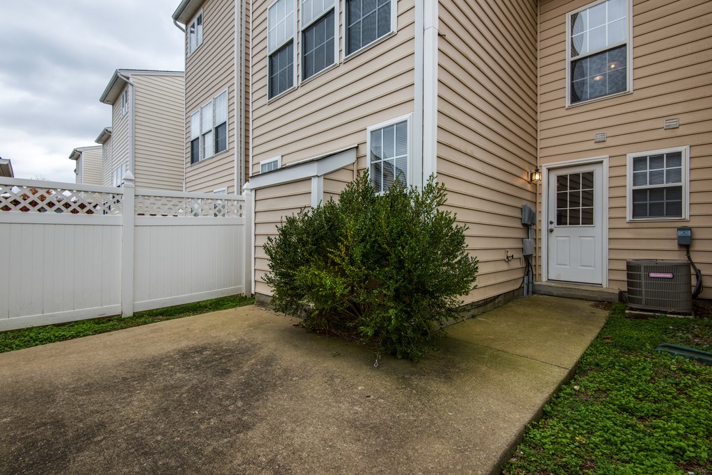 7831 Heaton Way Nashville, TN 37211 - Photo 34 of 35 a view of a house with backyard and garden