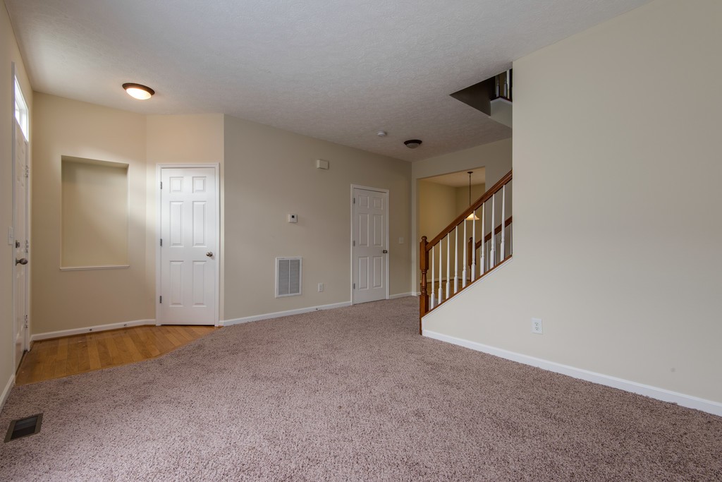 7831 Heaton Way Nashville, TN 37211 - Photo 6 of 35 a view of an empty room with wooden floor