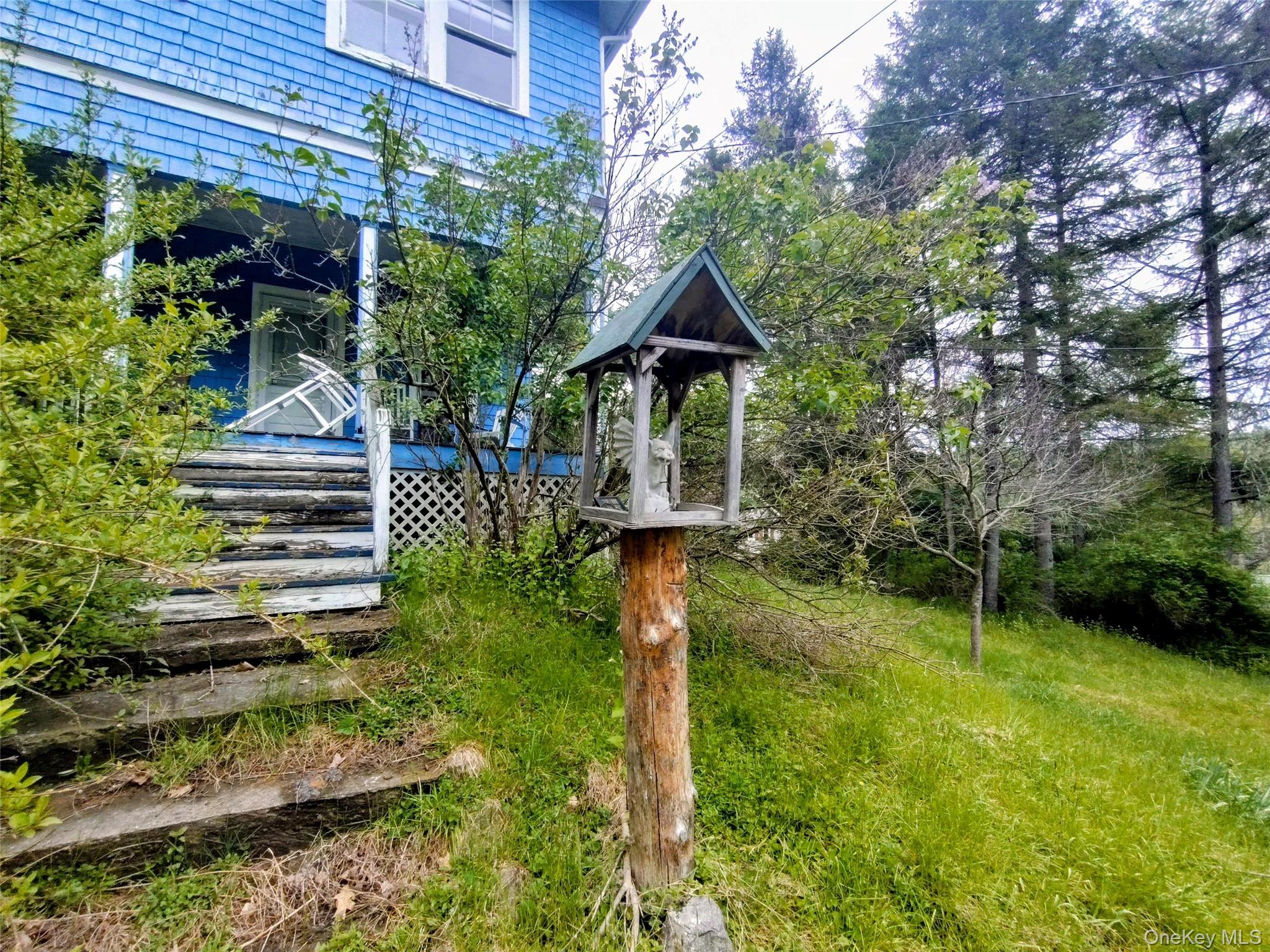 174 Forestburgh Road Forestburgh, NY 12777 - Photo 26 of 28 a front view of a house with garden