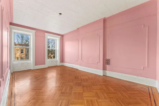 a car parked in front of a building