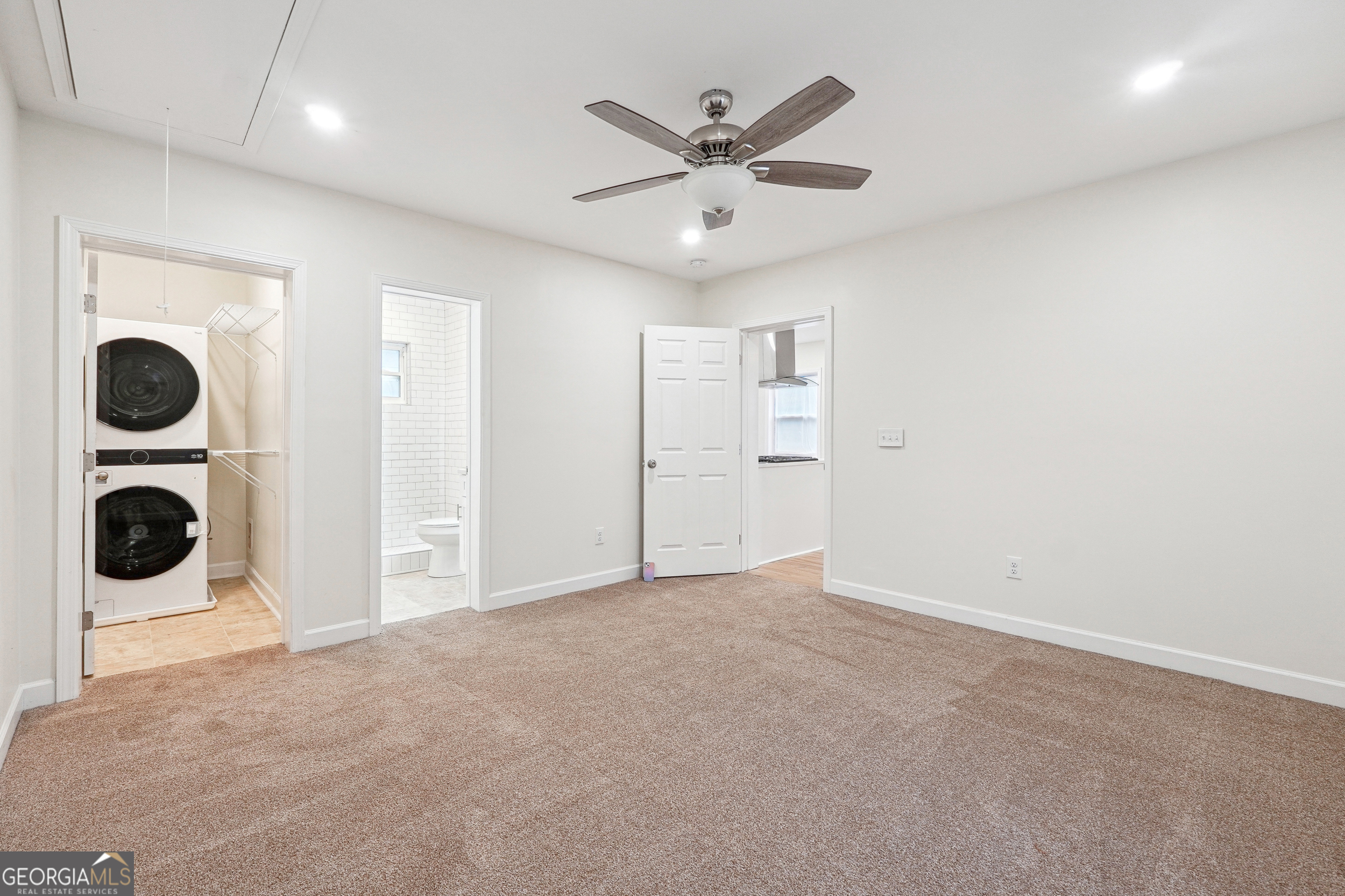 1032 Garibaldi Street Southwest, Unit B Atlanta, GA 30310 - Photo 19 of 30 an empty room with closet and windows