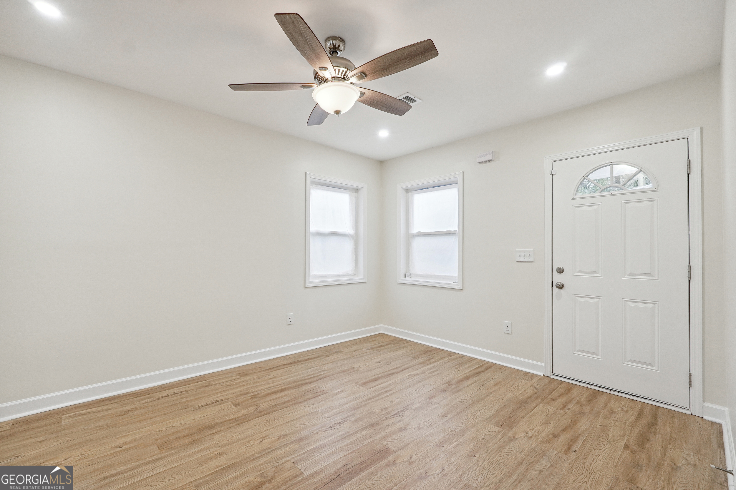 1032 Garibaldi Street Southwest, Unit B Atlanta, GA 30310 - Photo 25 of 30 wooden floor in an empty room with a window