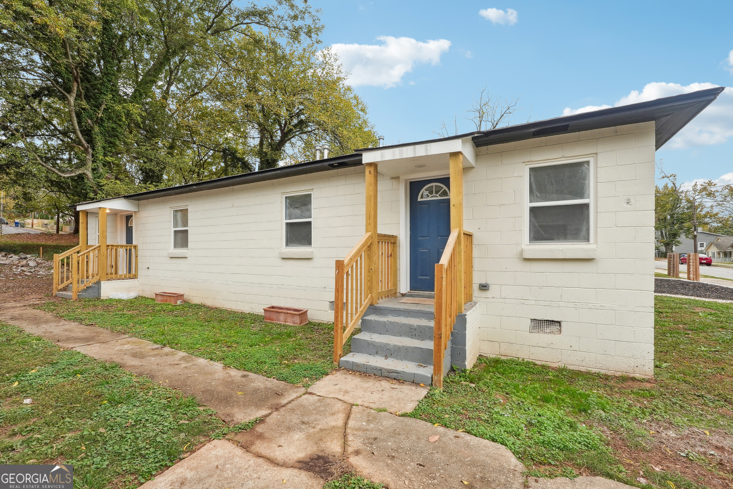 1032 Garibaldi Street Southwest, Unit B Atlanta, GA 30310 - Photo 30 of 30 a front view of a house with a yard
