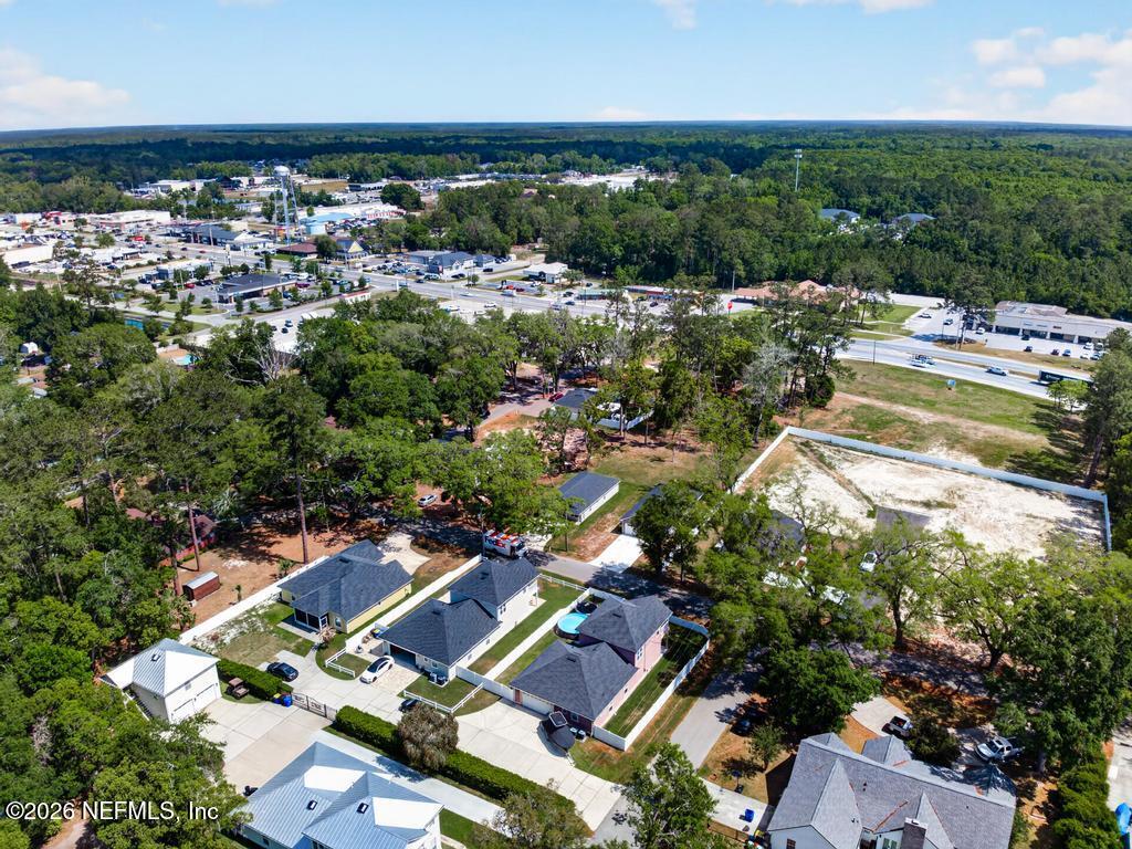 45107 South Booth Street Callahan, FL 32011 - Photo 65 of 68 an aerial view of residential houses with outdoor space