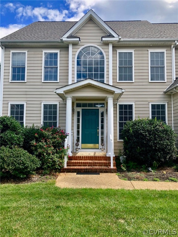 11904 Turning Branch Road Glen Allen, VA 23059 - Photo 4 of 5 a front view of a house with garden