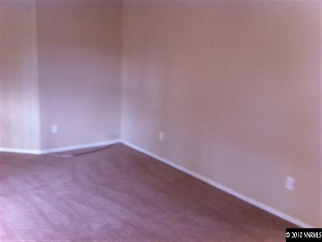 5870 Coyote Ridge Road Reno, NV 89523 - Photo 4 of 6 a view of an empty room