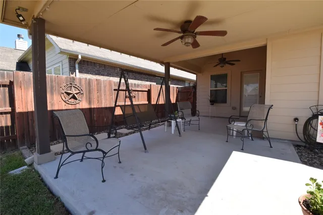a view of an outdoor space with furniture