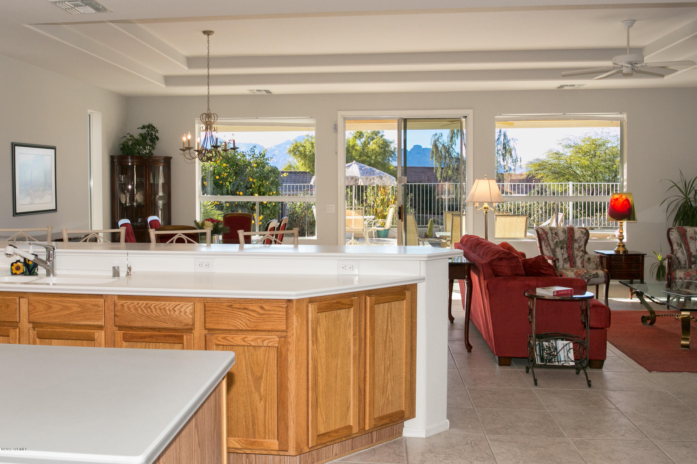 62419 East Northwood Road Tucson, AZ 85739 - Photo 15 of 30 a kitchen with a sink a counter top space and stainless steel appliances