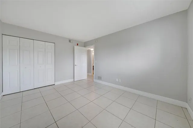 a view of an empty room and entryway