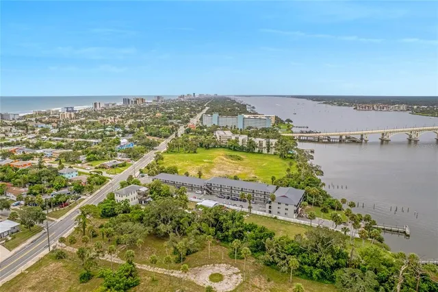 a view of a city with an ocean view