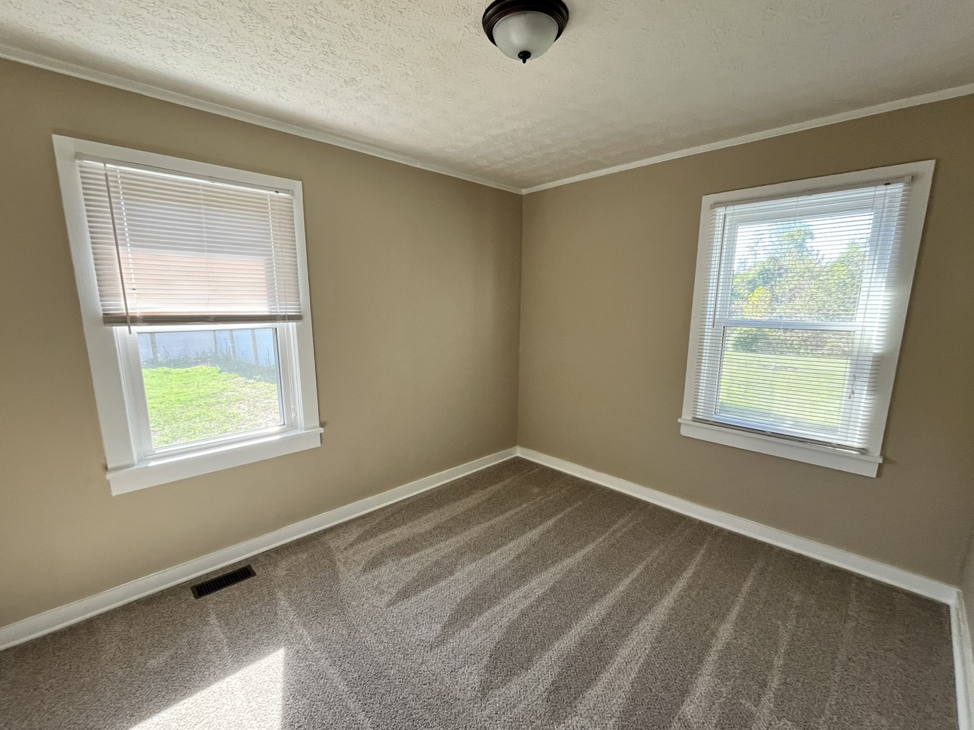 2220 Willette Road Red Boiling Springs, TN 37150 - Photo 13 of 30 an empty room with a window