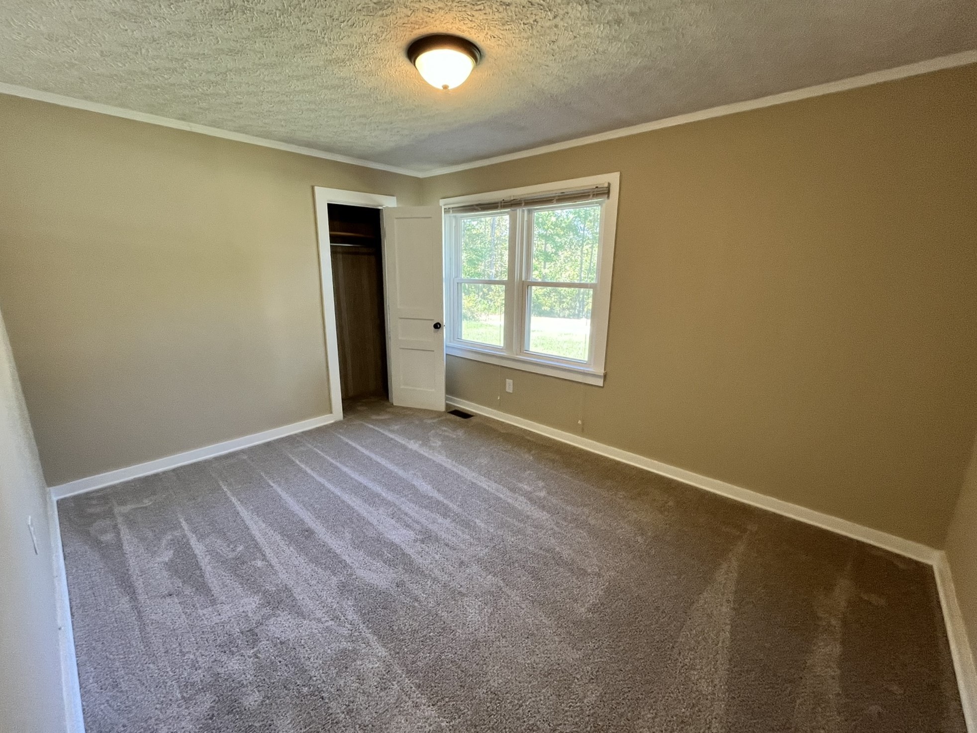 2220 Willette Road Red Boiling Springs, TN 37150 - Photo 16 of 30 an empty room with a window