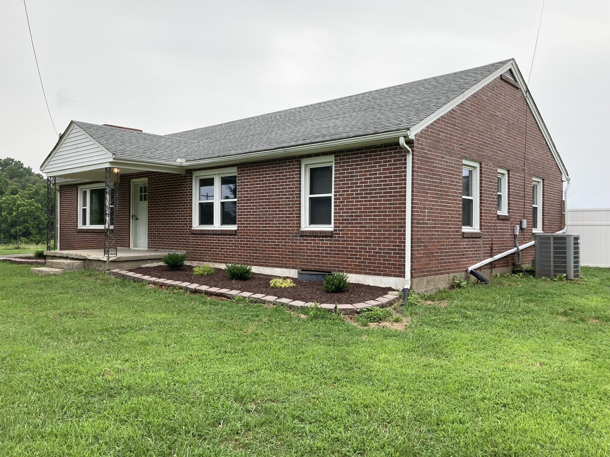 2220 Willette Road Red Boiling Springs, TN 37150 - Photo 30 of 30 a backyard of a house with lots of green space