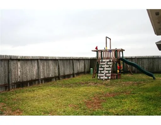 a view of a garden with a chair