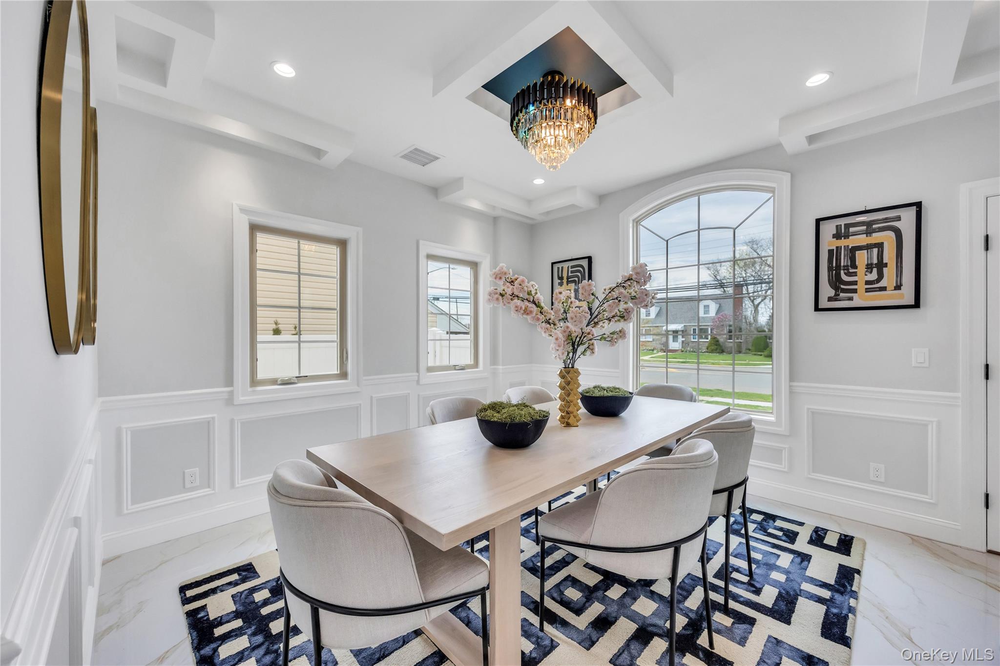 157 4th Street Hicksville, NY 11801 - Photo 6 of 20 Dining space featuring marble finish floor, a decorative wall, a wainscoted wall, and recessed lighting