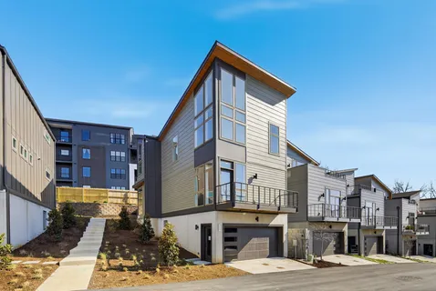 a view of a street with buildings