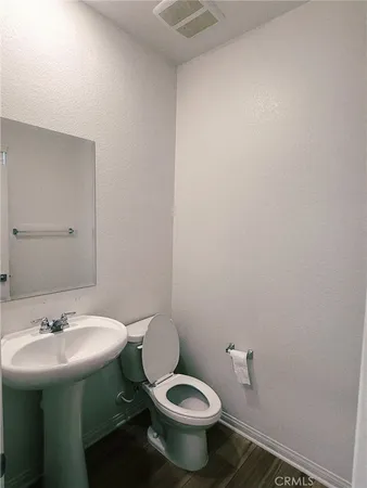 a bathroom with a sink and a toilet